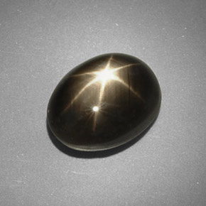 Zafiro estrella negro natural de 5,66 ct, corte óvalo, opaco