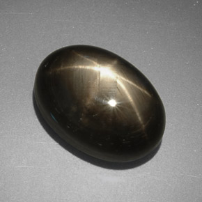 Zafiro estrella negro natural de 7,78 ct, corte óvalo, opaco