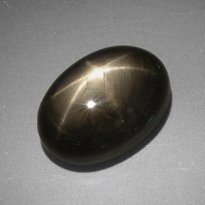 Zafiro estrella negro natural de 7,78 ct, corte óvalo, opaco