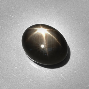Zafiro estrella negro natural de 6,28 ct, corte óvalo, opaco