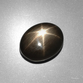 Zafiro estrella negro natural de 6,17 ct, corte óvalo, opaco
