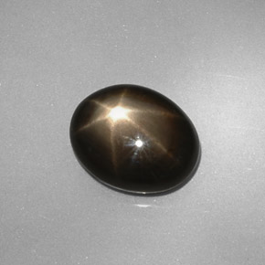 Zafiro estrella negro natural de 4,38 ct, corte óvalo, opaco