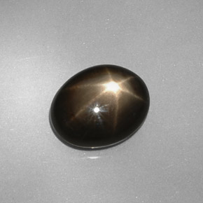 Zafiro estrella negro natural de 4,38 ct, corte óvalo, opaco