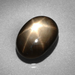 Zafiro estrella negro natural de 6,62 ct, corte óvalo, opaco