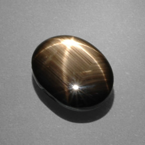 Zafiro estrella negro natural de 7,53 ct, corte óvalo, opaco