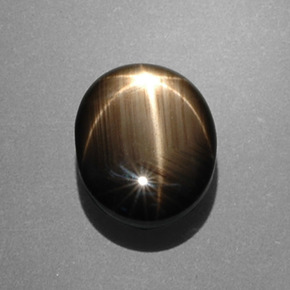 Zafiro estrella negro natural de 7,53 ct, corte óvalo, opaco