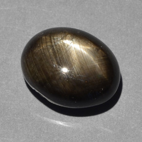 Zafiro estrella negro natural de 10,43 ct, corte óvalo, opaco