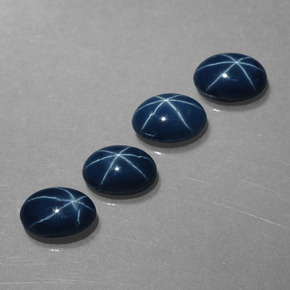 Gemas de zafiro estrella azul natural de  ct, corte óvalo, opaco