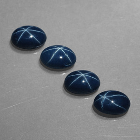 Gemas de zafiro estrella azul natural de  ct, corte óvalo, opaco