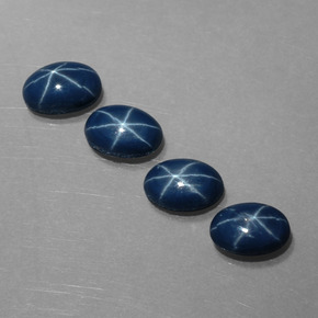 Gemas de zafiro estrella azul natural de  ct, corte óvalo, opaco