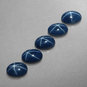 Gemas de zafiro estrella azul natural de  ct, corte óvalo, opaco