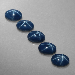 Gemas de zafiro estrella azul natural de  ct, corte óvalo, opaco