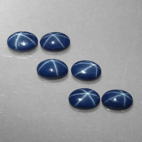 Gemas de zafiro estrella azul natural de  ct, corte óvalo, opaco