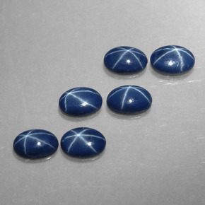 Gemas de zafiro estrella azul natural de  ct, corte óvalo, opaco