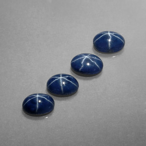 Gemas de zafiro estrella azul natural de  ct, corte óvalo, opaco