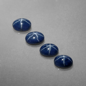 Gemas de zafiro estrella azul natural de  ct, corte óvalo, opaco