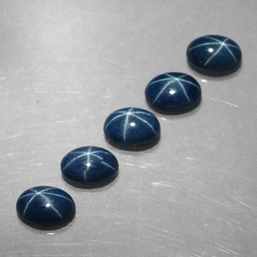 Gemas de zafiro estrella azul natural de  ct, corte óvalo, opaco