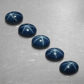 Gemas de zafiro estrella azul natural de  ct, corte óvalo, opaco