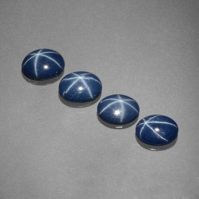 Gemas de zafiro estrella azul natural de  ct, corte óvalo, opaco