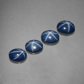 Gemas de zafiro estrella azul natural de  ct, corte óvalo, opaco