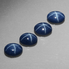 Gemas de zafiro estrella azul natural de  ct, corte óvalo, opaco