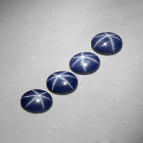Gemas de zafiro estrella azul natural de  ct, corte óvalo, opaco