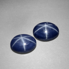 Gemas de zafiro estrella azul natural de  ct, corte óvalo, opaco
