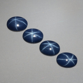 Gemas de zafiro estrella azul natural de  ct, corte óvalo, opaco