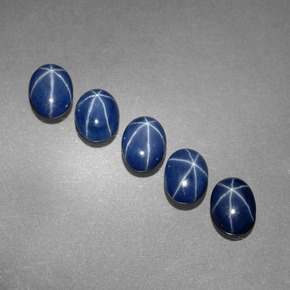 Gemas de zafiro estrella azul natural de  ct, corte óvalo, opaco