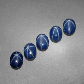 Gemas de zafiro estrella azul natural de  ct, corte óvalo, opaco