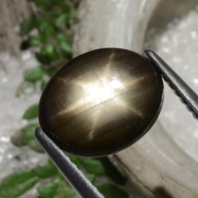 Zafiro estrella negro natural de 2,94 ct, corte óvalo, opaco
