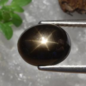 Zafiro estrella negro natural de 4,91 ct, corte óvalo, opaco