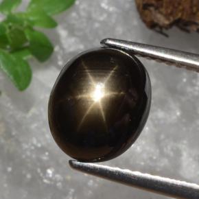 Zafiro estrella negro natural de 4,91 ct, corte óvalo, opaco