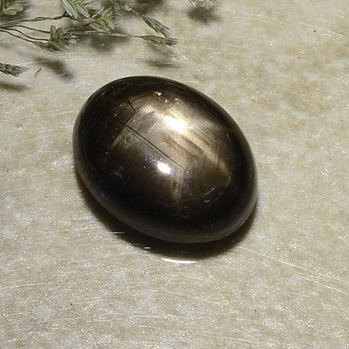 Zafiro estrella negro natural de 2,87 ct, corte óvalo, opaco