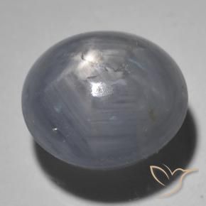 Zafiro estrella Gris oscuro natural de 5.41 ct, Ovalada, Translúcido