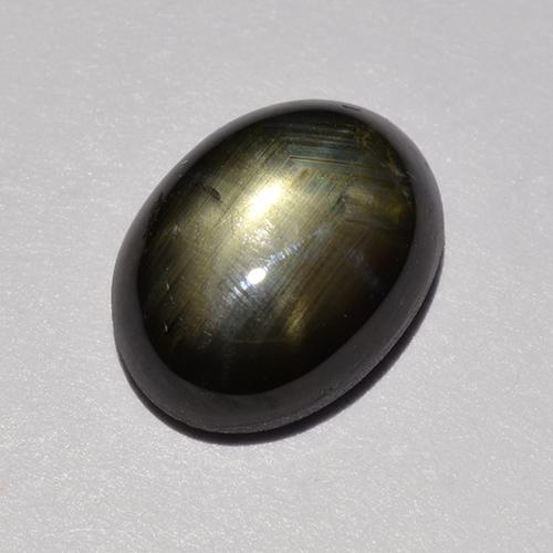 Zafiro estrella negro natural de 1,47 ct, corte óvalo, opaco