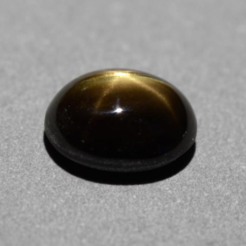 Zafiro estrella negro natural de 1,31 ct, corte óvalo, opaco