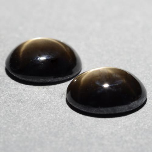 Gemas de zafiro estrella negro natural de 1,81 ct, corte óvalo, opaco