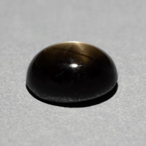 Zafiro estrella negro natural de 1,49 ct, corte óvalo, opaco