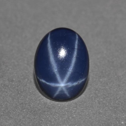 Zafiro estrella azul natural de 0,89 ct, corte óvalo, opaco