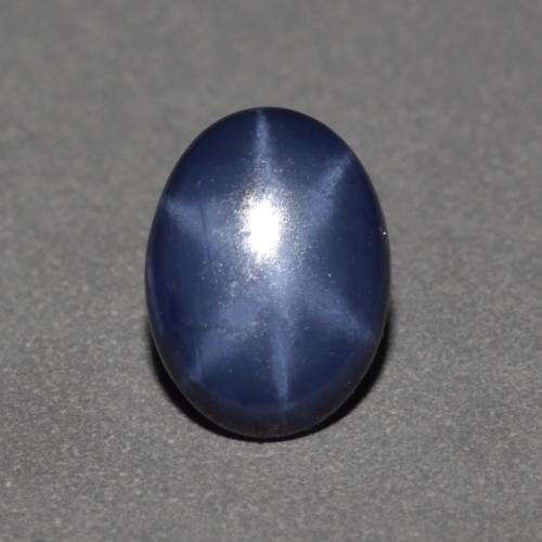 Zafiro estrella azul natural de 0,90 ct, corte óvalo, opaco
