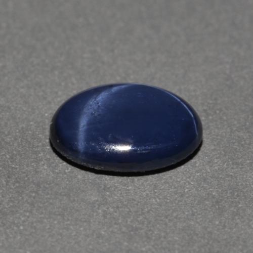 Zafiro estrella azul natural de 0,90 ct, corte óvalo, opaco