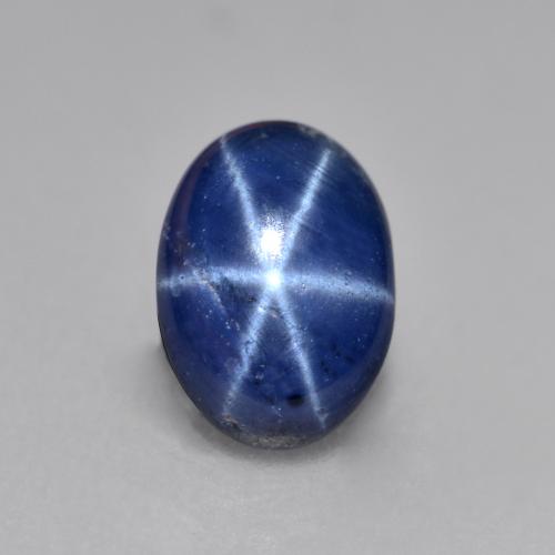 Zafiro estrella Azul oscuro natural de 0.99 ct, Corte Óvalo, Opaco