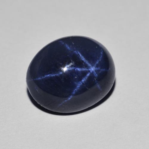 Zafiro estrella azul natural de 3,93 ct, corte óvalo, opaco