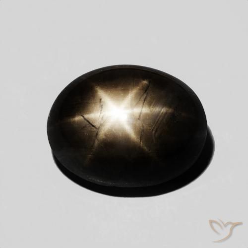 Zafiro estrella negro natural de 6,48 ct, corte óvalo, opaco