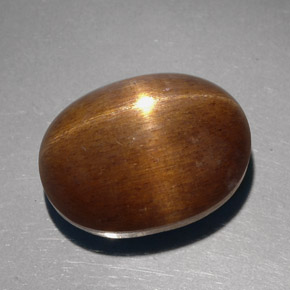 Piedra sol estrella marrón natural de 23,68 ct, corte óvalo, opaco