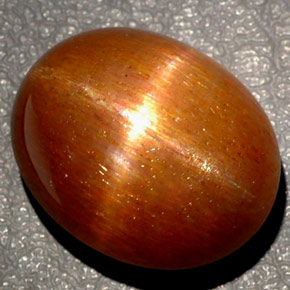 Piedra sol estrella marrón natural de 27,65 ct, corte óvalo, opaco
