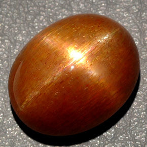 Piedra sol estrella marrón natural de 27,65 ct, corte óvalo, opaco