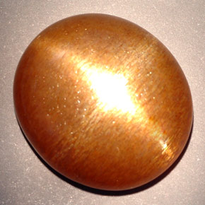 Piedra sol estrella marrón dorado natural de 23,28 ct, corte óvalo, opaco