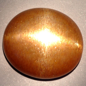 Piedra sol estrella marrón dorado natural de 23,28 ct, corte óvalo, opaco